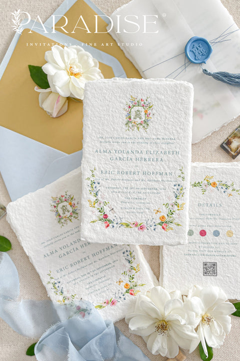 This exquisite wedding invitation set offers a blend of timeless charm and whimsical artistry. Each suite is printed on a luxurious handmade paper from our cotton rag suite, providing a rich, tactile feel. A delicate tassel is included with each invite, adding a playful pop of color and charm. The beautiful watercolor floral invites create a stunning and romantic preview of your special day.