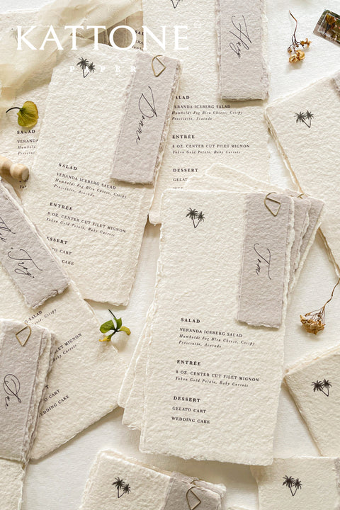 Bring sophistication to your reception tables with our luxury handmade paper wedding menus, designed for couples who appreciate timeless elegance and artisanal detail. Each menu is crafted on handmade cotton paper with natural deckled edges, creating a soft, organic texture that feels as exquisite as it looks. Paired with personalized guest name tags and subtle minimalist illustrations, these menus add a refined, cohesive touch to any fine art tablescape.