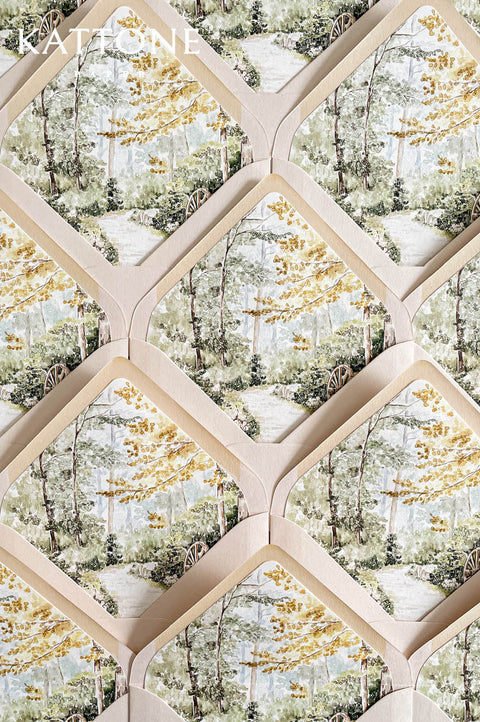Luxury wedding envelopes with custom watercolor garden liners featuring soft landscape artwork in delicate green, cream, and muted golden tones.
