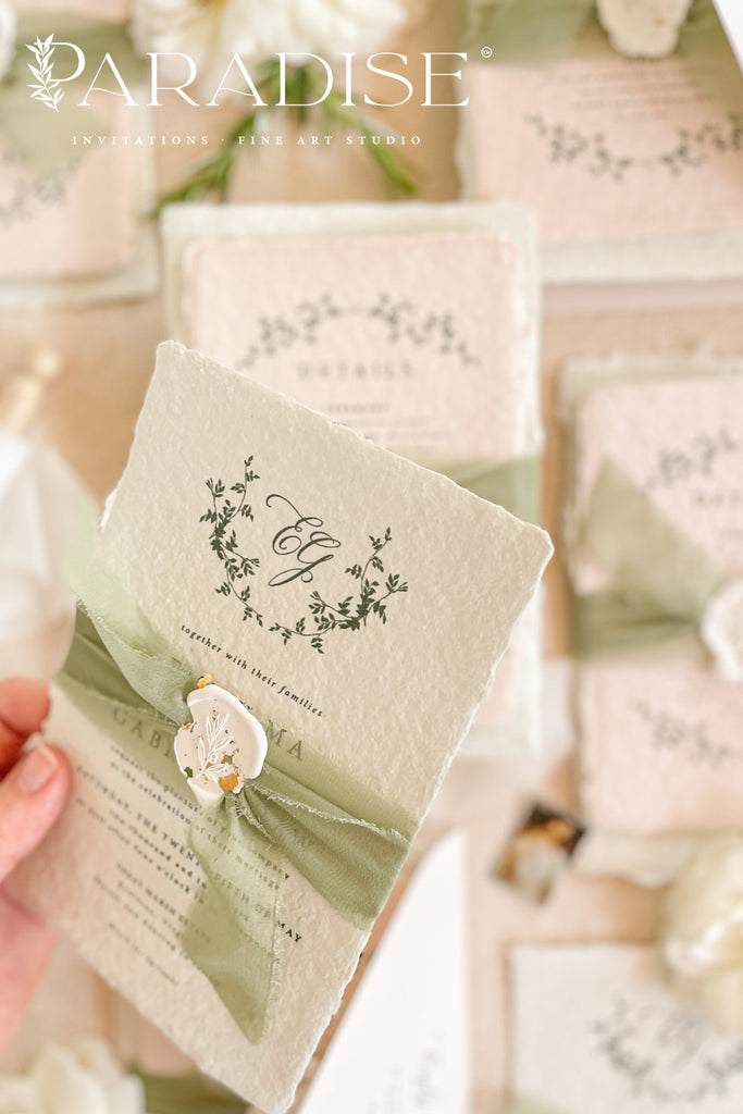 A collection of elegant wedding invitations with floral patterns, deckled edges, and presented with wax seals and silk ribbons.
#decklededgepaper #weddingplanner #silkribbons #cottonpaperinvitations #bridalshower #weddinginvitation #saveourdate #handmadepaper #weddingplanner #archinvitations #foilayage #vellum #savethedate #weddingphotographer #weddingflowers #invites #stationery #waxseals #menus #daystationery #menu #baptism #thankyoucards #modernweddings #foil #foiling #foilart