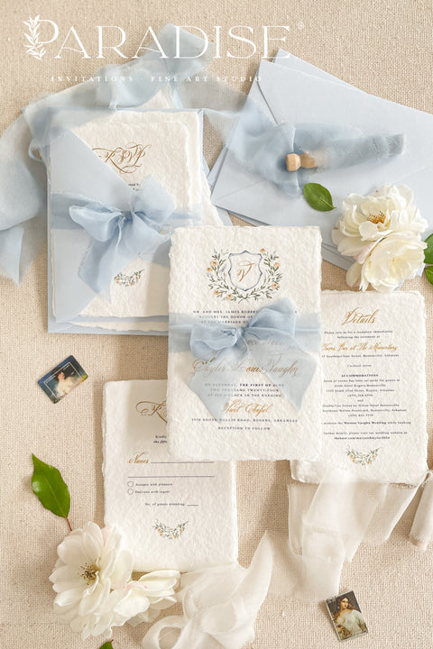 This exquisite wedding invitations suite offers a blend of timeless sophistication and personal artistry. Each handmade cotton paper invitation is a work of fine art, featuring a beautifully hand-painted watercolor monogram crest illustration. The result is a truly classy and elegant suite that feels both intimate and refined, setting a memorable and luxurious tone for your special day.