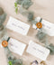 Enhance your tablescape with our handmade paper place cards, crafted from luxurious cotton rag paper and finished with naturally torn deckled edges. Each card features elegant calligraphy, soft hand-dyed ribbon, and the option of a wax seal for added fine-art charm. Perfect for weddings, engagement parties, showers, and upscale events, these artisanal place cards bring texture, romance, and sophistication to every setting.