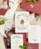 This exquisite wedding invitations suite offers a blend of natural texture and timeless charm. Each invite is printed on luxurious handmade paper with a delicate deckle edge, providing a rich, organic feel. The design is finished with a delicate golden leaf detail, adding a touch of understated elegance and luxury. The result is a truly memorable vintage style stationery set that beautifully hints at your special day.