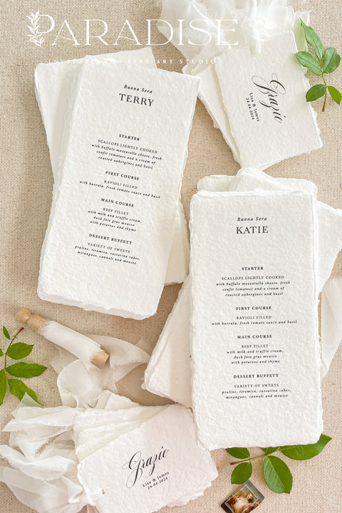 Elevate your wedding tablescape with our handmade paper wedding menus, beautifully printed on 100% cotton rag paper with naturally torn deckled edges. Each menu is a work of art - thoughtfully designed with elegant typography and soft, organic textures that bring fine art sophistication to your reception. These menus double perfectly as place cards, with personalized guest names printed at the top, offering a seamless and refined seating presentation.