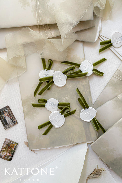 Elevate your invitations with timeless wax seals finished with soft velvet ribbon ties. Designed to add depth, texture, and old-world romance, these handcrafted seals create an unforgettable first impression for weddings, events, and fine stationery suites. Each piece is individually poured and paired with luxurious velvet ribbon, making every seal beautifully unique and tactile. Perfect for wedding invitations, vow renewals, luxury events, or keepsake stationery, these wax seals bring a refined, heirl