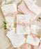 This exquisite wedding invitations suite offers a perfect blend of natural texture and personalized elegance. Each invite is a beautiful work of art, featuring a delicate floral invites design and a custom monogram created just for you. Printed on luxurious handmade paper with a romantic deckle edge, these pretty invites are a tactile and beautiful preview of your special day.