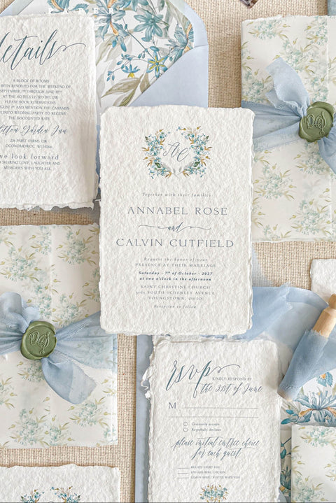 Set a sophisticated and thoughtful tone for your coastal celebration with these unique wedding invites. Perfect for a beach wedding, this suite features a classic navy theme with a beautifully designed wedding timeline to guide your guests through your special day. The elegant calligraphy design adds a touch of classic romance, while the eco-conscious materials ensure your stationery is a beautiful and responsible choice for your special day.