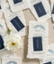 Bring timeless refinement to your reception with these handmade paper wedding menus, featuring a deep navy name tag and blue botanical artwork delicately printed on luxurious cotton paper. Each piece is hand-torn with naturally deckled edges, offering an authentic fine-art texture that perfectly complements elegant, coastal, or destination weddings. Perfectly suited for formal receptions, fine-art weddings, and refined dinner parties.