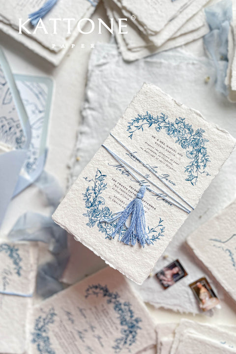 Embrace bohemian charm and natural elegance with the Juliette boho rustic stationery sets. Each handmade wedding invitation is a beautiful work of art, featuring luxurious cotton rag paper with a romantic deckle edge. To complete the bohemian feel, every suite is embellished with a delicate tassel, creating a uniquely personal and tactile experience for your guests. The combination of rustic textures and charming details makes this collection perfect for a relaxed and romantic celebration.