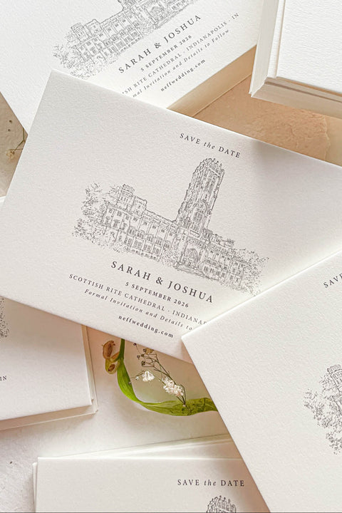 Announce your wedding day with classic sophistication through our Save the Date cards featuring a hand-drawn venue illustration. Printed on luxury textured cardstock with fine art precision, each card beautifully showcases your wedding location - from grand cathedrals to countryside estates - creating a personal and elegant keepsake.