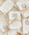 Invite your guests to your special day with the artful and personal charm of these custom wedding invitations. The unique suite features a beautiful, custom venue illustration sketch, hand-drawn by us to capture the essence of your wedding location. Designed with a light summer breeze theme and a boho chic aesthetic, this wedding stationery sets a warm, relaxed, and intimate tone for your upcoming celebration.