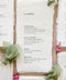 Handmade paper wedding menu with deckled edges, sage silk ribbon styling, minimalist typography, fine art reception stationery flat lay.