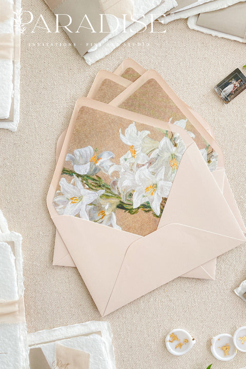 Soft neutral wedding envelopes with floral envelope liners, featuring fine art botanical illustrations printed inside for elegant and romantic wedding stationery.