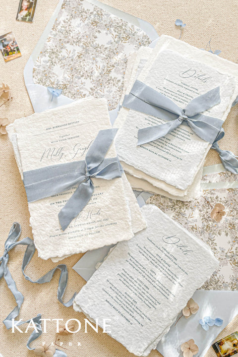 This exquisite handmade cotton paper wedding invitations suite offers a blend of natural elegance and personalized artistry. Each invite is a work of fine art, with a beautiful custom calligraphy design created just for you. The luxurious, textured paper and romantic typography create a truly memorable and heartfelt stationery set that will be cherished by your guests long after your special day.