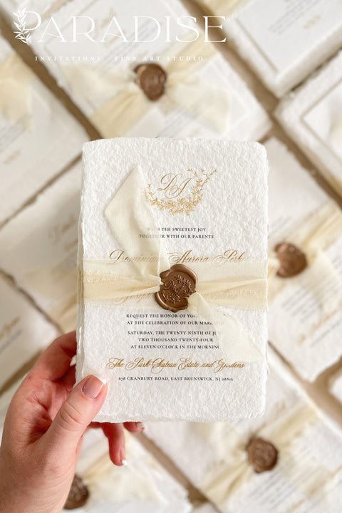 This exquisite wedding invitations suite offers a blend of natural elegance and personalized artistry. Perfect for an ivory classy wedding, each invite features a bespoke floral custom monogram, created just for you. As an eco friendly wedding invites choice, this stationery is both beautiful and sustainable, making it a thoughtful and sophisticated way to set the tone for your special day.