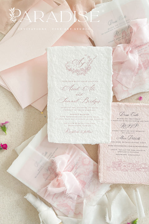 Announce your special day with the effortless, romantic charm of these handmade paper wedding invitations. Crafted for a boho wedding, this suite captures the free-spirited beauty of the season. Each invite is printed on soft and luxurious cotton paper, providing a unique, tactile experience for your guests. The light, airy design and premium paper are the perfect combination for a memorable summer wedding.