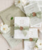 This exquisite wedding invitations suite offers a blend of natural elegance and modern romance. Perfect for a green summer wedding, these invitations are printed on luxurious handmade paper, which provides a rich, tactile feel. The elegant modern calligraphy design adds a touch of contemporary sophistication, setting a fresh and heartfelt tone for your special day.