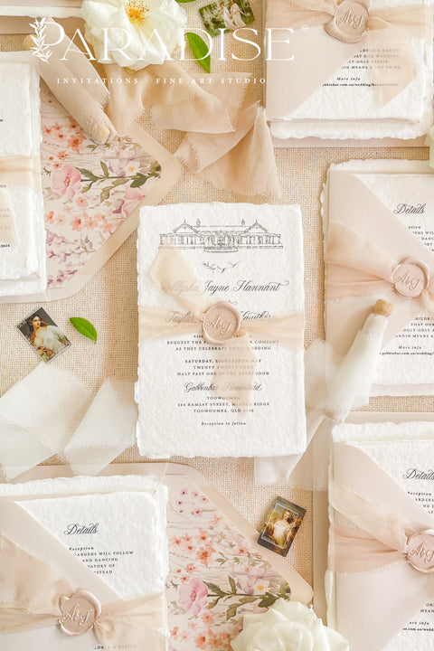 Announce your marriage with a truly bespoke and luxurious experience. These handmade paper wedding invitations feature a unique custom wedding venue illustration, hand-drawn by us to capture the charm of your special location. Each invitation is beautifully presented with a translucent vellum belly band and finished with a personalized wax seal, adding a final touch of elegant sophistication that your guests will adore.