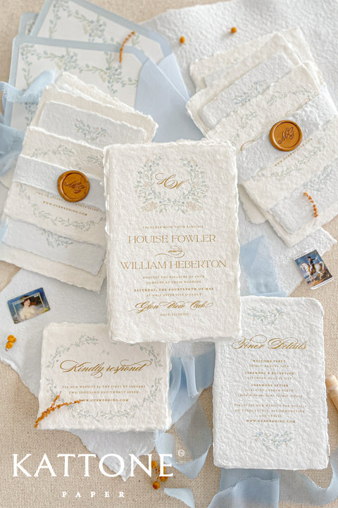 Embrace bohemian charm and natural elegance with the Alcina boho rustic stationery sets. Each handmade wedding invitation is a beautiful work of art, featuring luxurious cotton rag paper with a romantic deckle edge. To complete the bohemian feel, every suite is embellished with a delicate tassel, creating a uniquely personal and tactile experience for your guests. The combination of rustic textures and charming details makes this collection perfect for a relaxed and romantic celebration.