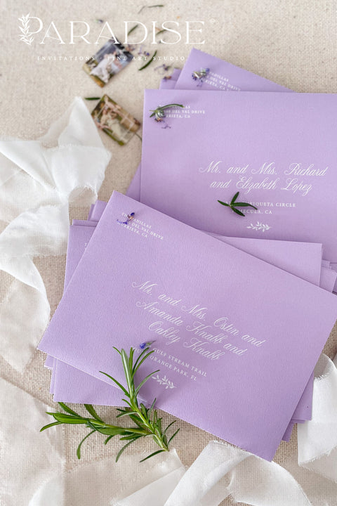 Luxury mauve wedding envelopes with printed addresses made from premium paper, designed for romantic and refined fine art invitation suites.
