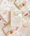 This exquisite wedding invitations suite offers a blend of timeless charm and personalized artistry. The suite features beautiful pretty stationery enclosed in a translucent custom toile de jouy vellum jacket, printed with your unique custom crest monogram. The result is a truly elegant and memorable keepsake that sets a romantic and intimate tone for your special day.