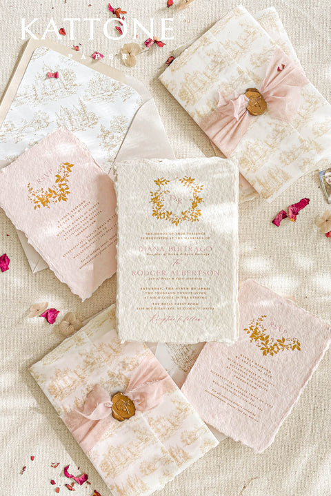This exquisite wedding invitations suite offers a blend of timeless charm and personalized artistry. The suite features beautiful pretty stationery enclosed in a translucent custom toile de jouy vellum jacket, printed with your unique custom crest monogram. The result is a truly elegant and memorable keepsake that sets a romantic and intimate tone for your special day.