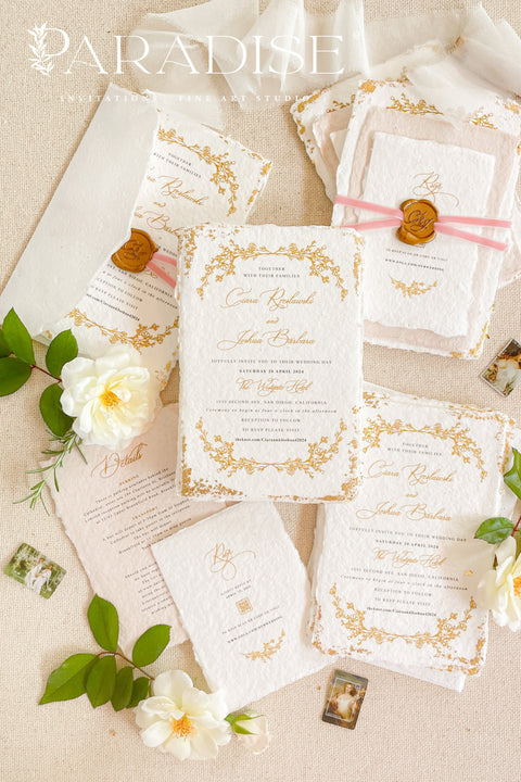This exquisite wedding invites suite offers a blend of handcrafted artistry and opulent details. The invitations are printed on premium handmade paper, which provides a rich, tactile feel and a timeless finish. A delicate golden leaf detail, luxurious velvet ribbons, and personalized wax seals are combined to create a truly lux elegant and memorable keepsake that sets a sophisticated tone for your special day.