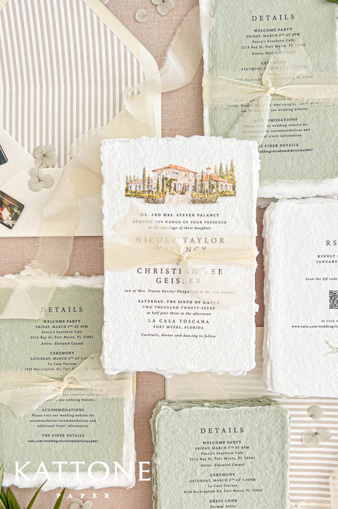 Overhead flat lay of an ivory handmade paper wedding invitation suite featuring a watercolor villa illustration, pale sage green wedding details cards tied with ivory ribbon, a matching RSVP card with QR code, and an ivory envelope with a neutral striped liner, styled on natural linen.