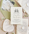 Handmade paper wedding invitations with a custom watercolor wedding venue illustration, deckle edges, and elegant typography.