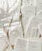Elevate your table styling with our handmade paper menus, beautifully crafted on 100% cotton paper with natural deckled edges. Each piece showcases refined typography and minimalist detailing, creating an effortless fine-art look. Perfect for romantic, luxury, or destination weddings, these menus add a bespoke touch of texture and authenticity to your reception tables - timeless heirlooms of modern elegance.