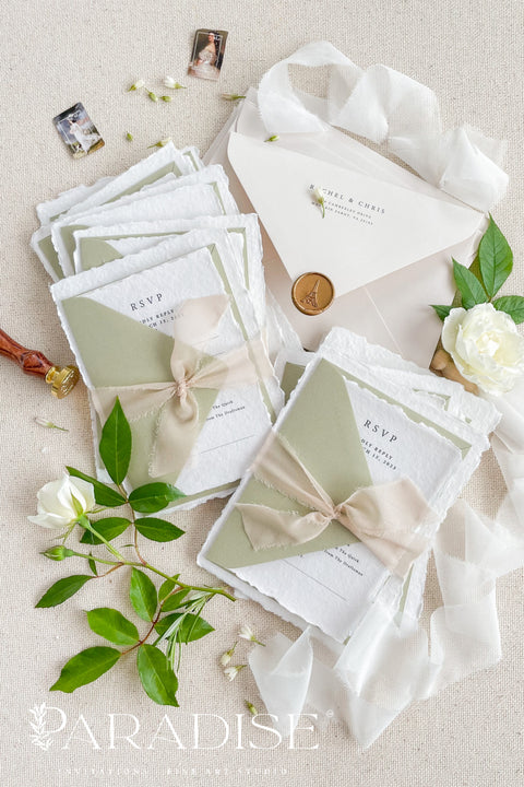 Celebrate your love story with our handmade deckled-edge wedding invitations, beautifully crafted with soft sage green accents, silk ribbon, and timeless wax seals. Each invitation is made by hand on luxurious 100% cotton paper, giving every piece an organic texture and an authentic fine art finish.