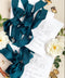 Hand-drawn venue artwork meets fine-art craftsmanship in these beautifully assembled wedding programs. The soft blue ribbon, textured cotton paper, and delicate illustration create an heirloom-quality piece that sets the tone for a romantic, detail-rich ceremony. Each program balances sophistication with warmth, offering guests a meaningful preview of your celebration.