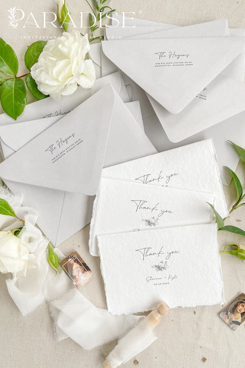 Express gratitude with understated elegance through these handmade paper thank you cards. Crafted from luxurious cotton rag paper with naturally deckled edges, each card features refined typography and a soft, minimalist aesthetic. Designed to pair beautifully with fine-art wedding stationery, these cards offer a timeless way to thank your guests while becoming a keepsake they’ll cherish long after your celebration.