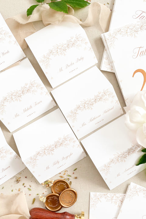 Elevate your table styling with our place cards, designed on premium cardstock and adorned with an elegant botanical illustration. Their refined aesthetic blends beautifully with classic, romantic, and fine-art wedding themes, offering a polished and cohesive look for any event. These folded cards stand effortlessly on tables, providing both function and graceful sophistication for your seating arrangements.