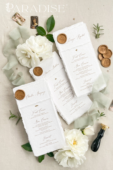Capture timeless elegance with these handmade paper wedding menus, featuring classic deckled edges, refined calligraphy, and a luxurious gold wax seal. Each menu is handcrafted from 100% cotton rag paper, lending a rich texture and organic feel that instantly elevates any fine-art or romantic wedding aesthetic. Whether you’re hosting an intimate garden celebration, a formal black-tie dinner, or a destination wedding.