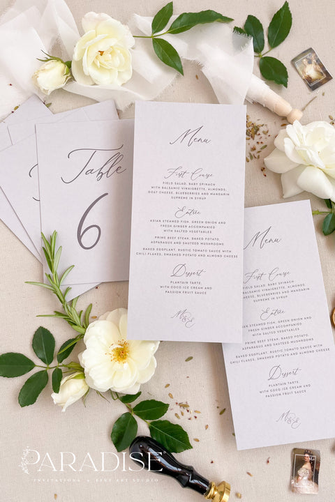 Bring timeless grace to your tablescape with our handcrafted wedding menus printed on soft grey cardstock. Each piece blends fine typography and minimal design, creating a balanced look between sophistication and simplicity. Perfect for romantic, modern, or classic weddings, these menus coordinate beautifully with matching table numbers and stationery for an effortlessly cohesive aesthetic.