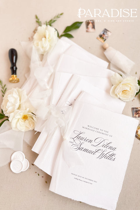 Bring timeless elegance to your ceremony with this classic wedding program, printed on premium white cardstock and finished with soft chiffon ribbon. The refined script typography and clean layout create an elevated fine-art feel - perfect for romantic, traditional, and modern-classic weddings. A beautiful keepsake your guests will cherish.