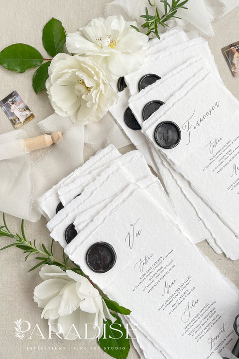 Add a touch of timeless sophistication to your wedding table with our handmade paper menus, sealed with a luxurious black wax emblem. Crafted on deckled-edge cotton rag paper, these menus embody fine art elegance and artisanal craftsmanship - a perfect balance of simplicity and grandeur. Ideal for romantic, modern, or classic weddings, each menu is hand-finished for a refined aesthetic that leaves a lasting impression on your guests.