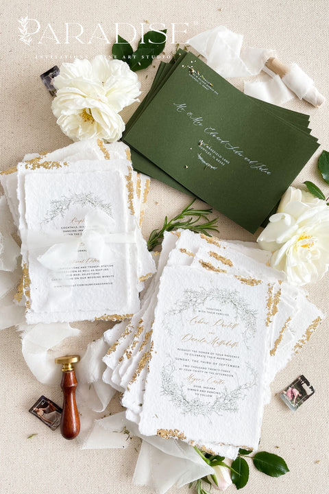 Announce your summer celebration with the perfect blend of bohemian charm and elegant sophistication with these exquisite wedding invitations. The unique wreath design adds a touch of natural beauty, while the delicate golden leaf detail provides a subtle, luxurious shimmer. This boho chic stationery is perfect for a laid-back, romantic summer wedding, setting a warm and inviting tone for your guests.