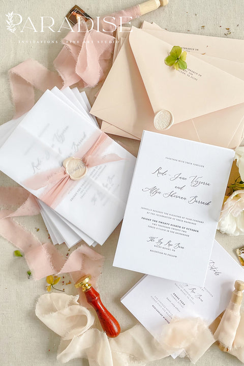 Delicate, romantic, and effortlessly graceful - this letterpress wedding invitation suite blends modern minimalism with artisanal charm. Each piece is crafted on thick, premium cotton paper, with deep letterpress impressions that capture the poetry of fine stationery. Wrapped in translucent vellum, tied with a blush silk ribbon, and finished with a wax seal, this suite is designed for couples who appreciate sophistication in every detail.