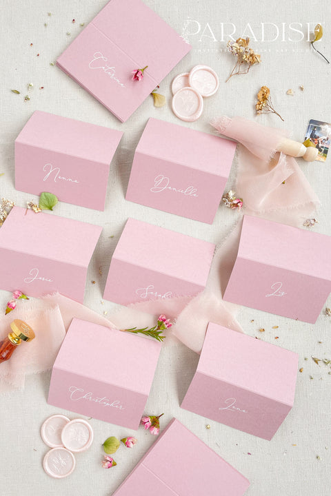 Add a modern pop of color to your event with our colored paper place cards, crafted from premium heavyweight cardstock and folded for a polished, freestanding design. Each card features elegant calligraphy in a soft contrasting tone, making them perfect for weddings, bridal showers, birthdays, baby showers, and stylish celebrations. These vibrant place cards bring personality, charm, and a refined touch to your tablescape while remaining beautifully cohesive with contemporary event aesthetics.