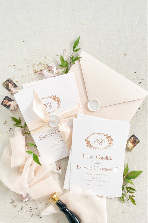 Announce your special day in elegant style with our Save the Date cards, featuring a refined rose gold monogram wreath, soft blush silk ribbon, and a hand-stamped wax seal. Printed on luxury textured cardstock with a clean, timeless layout, this design exudes sophistication and modern romance - perfect for fine-art, romantic, or garden weddings.