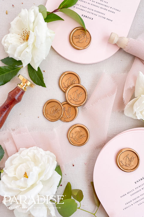 Golden wax seals bring a warm, timeless elegance to your wedding stationery, adding a luxurious finishing touch to envelopes, invitations, and keepsakes. Hand-poured with care, each seal features a rich golden tone that catches the light beautifully, creating a refined detail that feels both classic and romantic. Perfect for weddings, bridal showers, christenings, and fine-art paper suites, these wax seals elevate every piece they adorn.