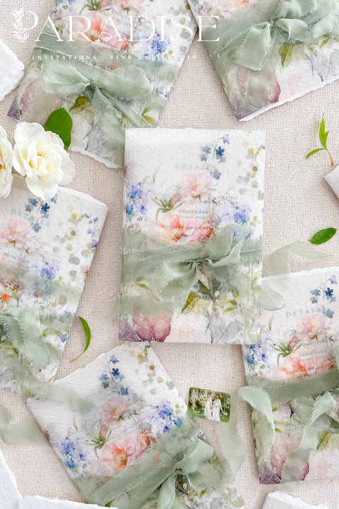 This exquisite wedding invitations suite offers a blend of fine artistry and natural elegance. Each invite is printed on luxurious handmade paper with beautiful deckled edges, providing a rich, tactile feel. The centerpiece is a custom, hand drawn watercolor venue illustration that captures the unique charm of your location, creating a truly memorable keepsake for your guests. This suite is perfect for a garden wedding, beautifully capturing the romantic and serene atmosphere.