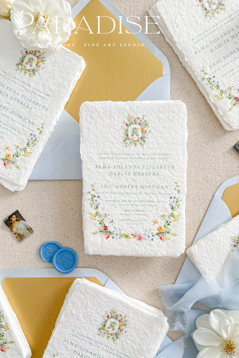This exquisite wedding invitation set offers a blend of timeless charm and whimsical artistry. Each suite is printed on a luxurious handmade paper from our cotton rag suite, providing a rich, tactile feel. A delicate tassel is included with each invite, adding a playful pop of color and charm. The beautiful watercolor floral invites create a stunning and romantic preview of your special day.