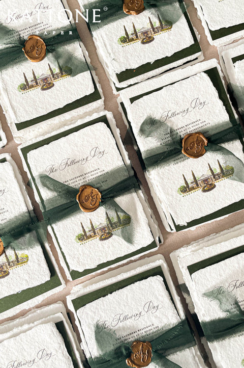 Premium wedding invitation suite with botanical crest artwork, deckled paper, vellum wraps, chiffon ribbon, and elegant green luxury styling.