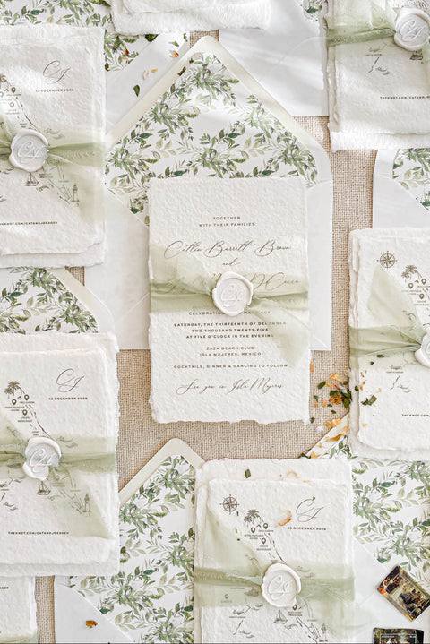 Announce your special day with the serene and natural beauty of these handmade paper wedding invitations. Perfect for a garden wedding or an outdoor celebration, this suite combines the luxurious, tactile feel of artisan paper with a delicate botanical design. The result is a truly romantic set of wedding stationery that will enchant your guests and beautifully set the tone for your special day.