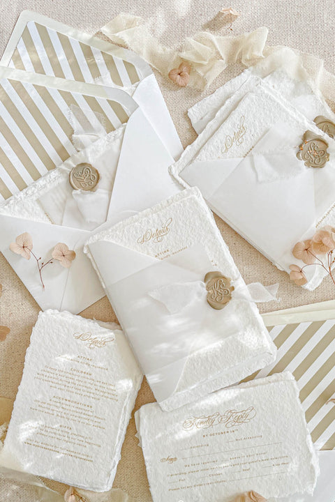 Announce your special day with a personal and artistic touch with this beautiful handmade paper wedding invitation set. Each suite features a one-of-a-kind, hand-drawn custom wedding venue watercolor, lovingly painted to capture the unique charm of your wedding location. Perfect for a summer wedding, the watercolor artwork and tactile paper create a soft, romantic, and memorable first impression for your guests.
