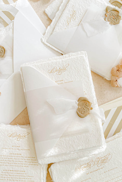 Announce your special day with a personal and artistic touch with this beautiful handmade paper wedding invitation set. Each suite features a one-of-a-kind, hand-drawn custom wedding venue watercolor, lovingly painted to capture the unique charm of your wedding location. Perfect for a summer wedding, the watercolor artwork and tactile paper create a soft, romantic, and memorable first impression for your guests.