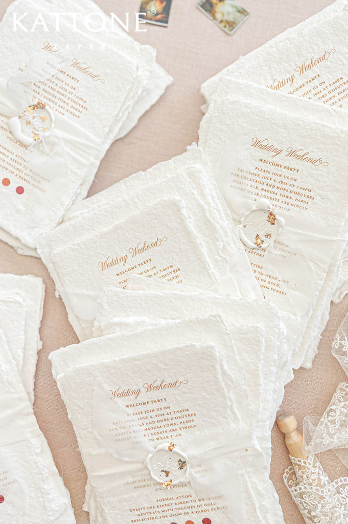 Coordinated wedding stationery suite including invitation, welcome cards and details inserts with cohesive design elements.